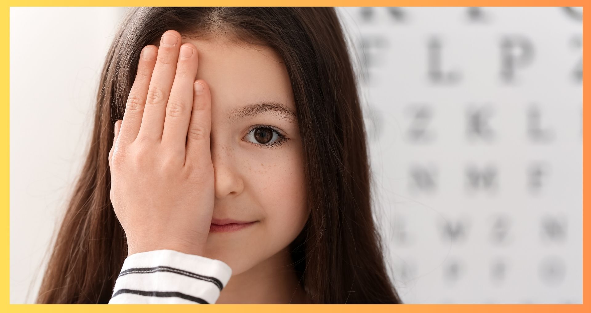 Young girl having routine eye exam with eye chart at optometrist office